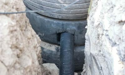 Септик из покрышек: обустройство переливной трубы