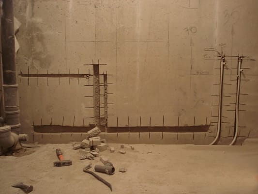 Как закрыть трубы в ванной