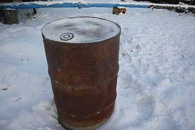 Металлическая бочка отлично подойдет под корпус для печи