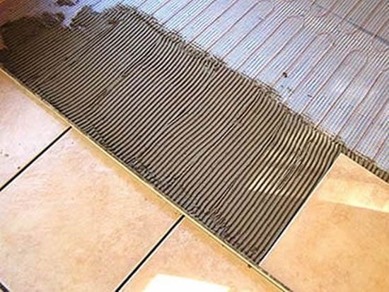 Укладка кафельной плитки на теплый пол