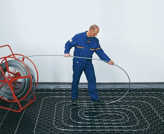 Укладка труб водяного отопления способом под названием улитка