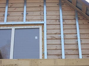 Фото металлическая обрешетка под сайдинг фото